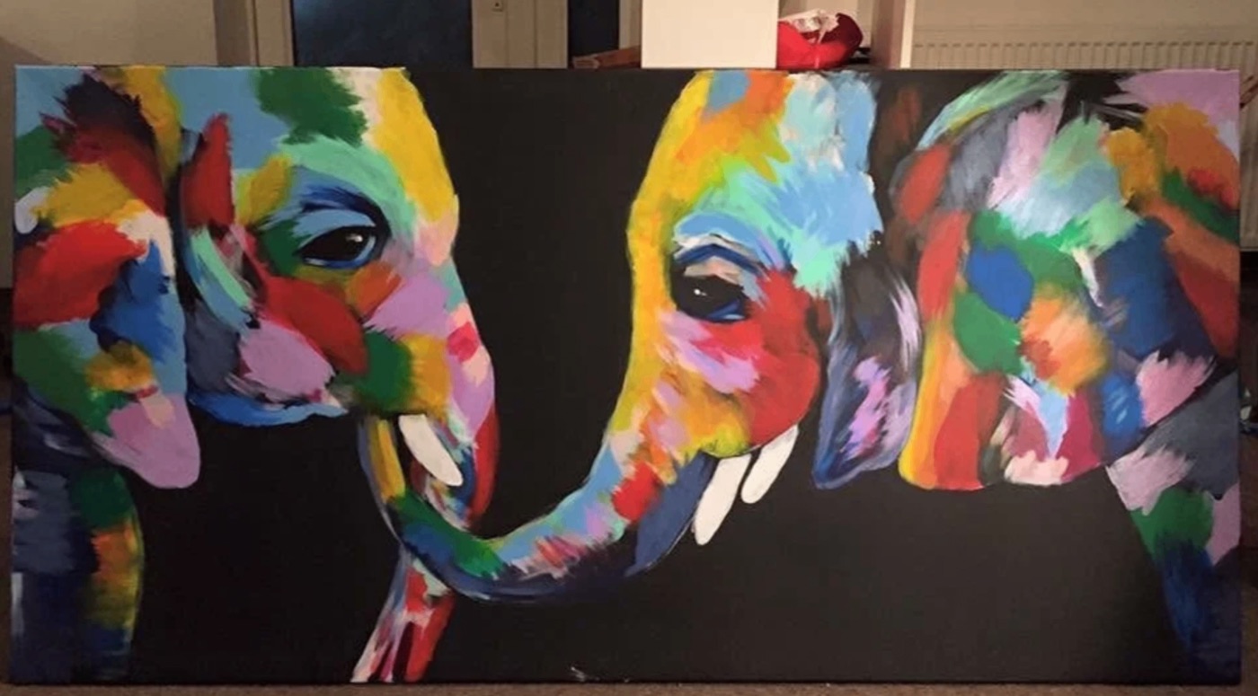 Vivid multicolored painting of two elephants touching trunks