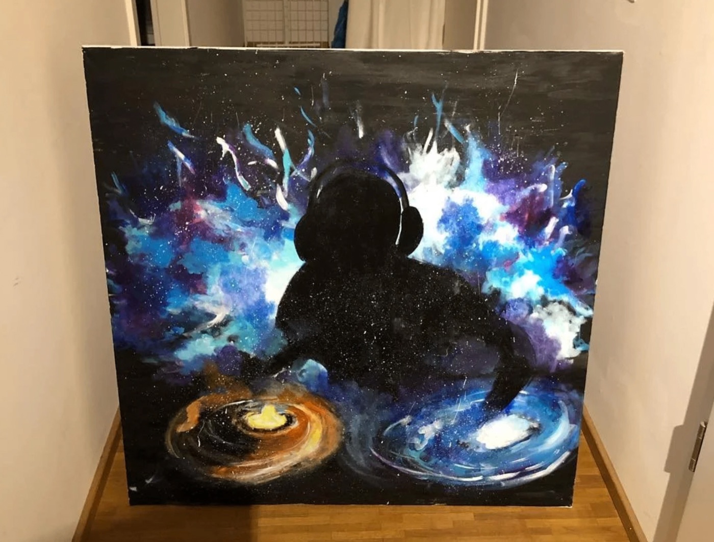 Painting of a figure in headphones against a cosmic galaxy